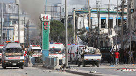 Twin car bombings kill at least 100 in Somalia
